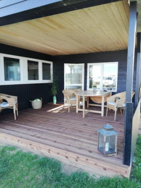 Strandlejlighed med havudsigt
